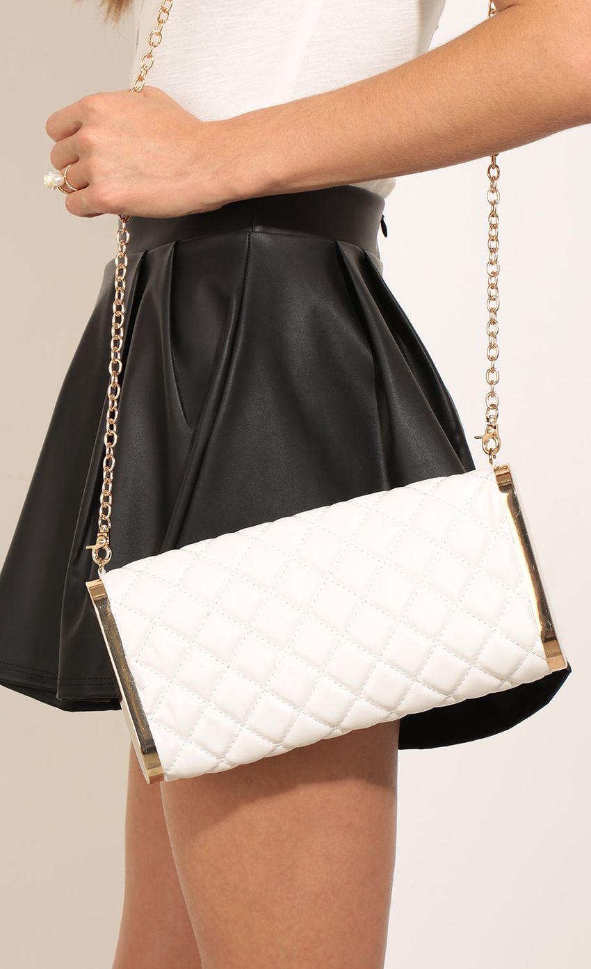 Picture Quilted Faux Leather Clutch Purse. Source: https://media-img.lucyinthesky.com/data/Mar17_1/850xAUTO/0Y5A6921.JPG