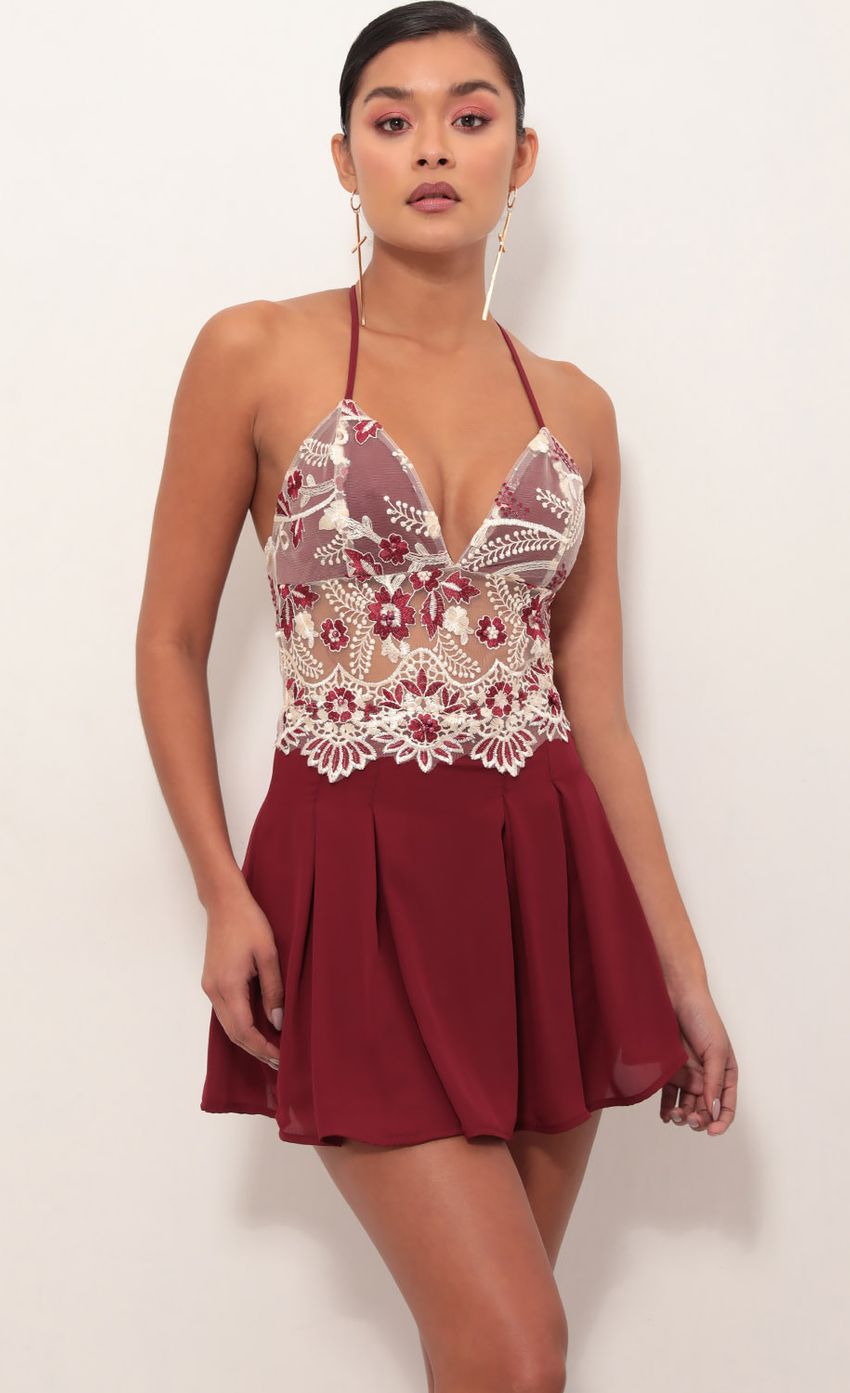 Picture Tulum Embroidered Lace Romper in Merlot. Source: https://media-img.lucyinthesky.com/data/Mar19_1/850xAUTO/781A3640S.JPG