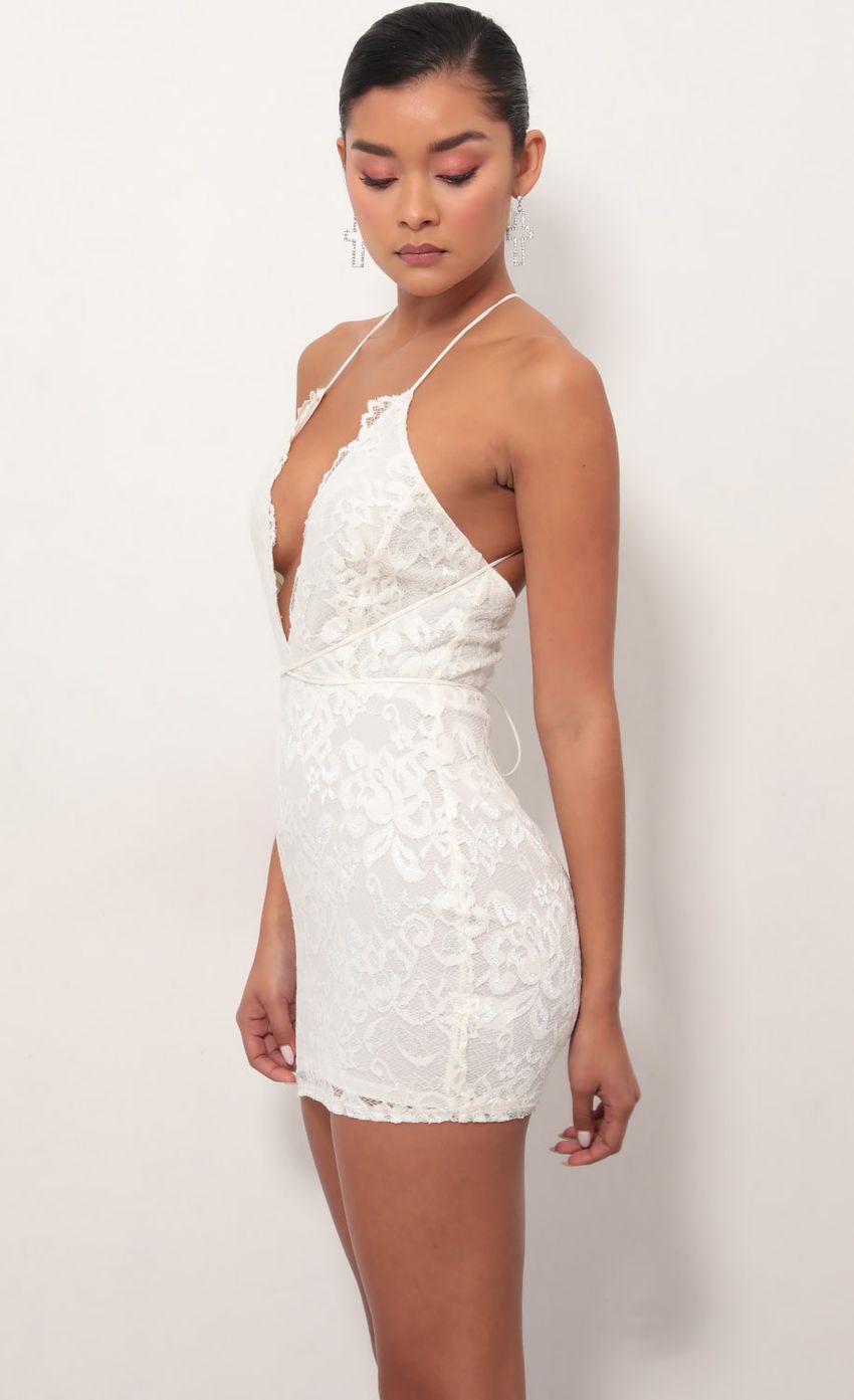 Picture Daniela Plunge Lace Dress in Ivory. Source: https://media-img.lucyinthesky.com/data/Mar19_1/850xAUTO/781A5776.JPG