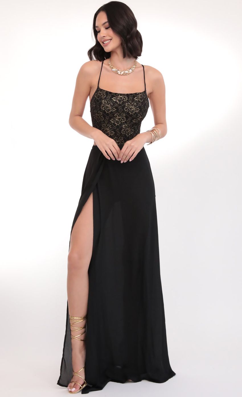 Picture Paris Gold Lace Maxi Dress in Black. Source: https://media-img.lucyinthesky.com/data/Mar20_1/850xAUTO/781A5645.JPG