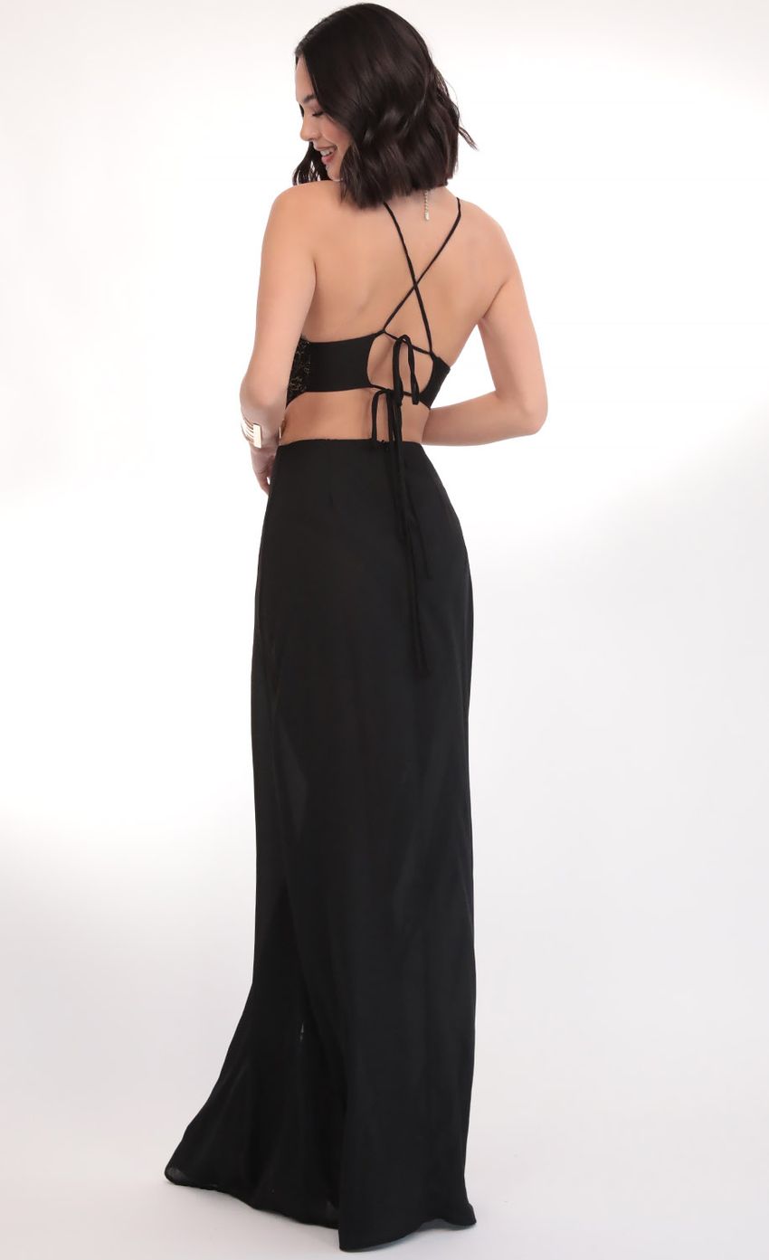 Picture Paris Gold Lace Maxi Dress in Black. Source: https://media-img.lucyinthesky.com/data/Mar20_1/850xAUTO/781A5721.JPG