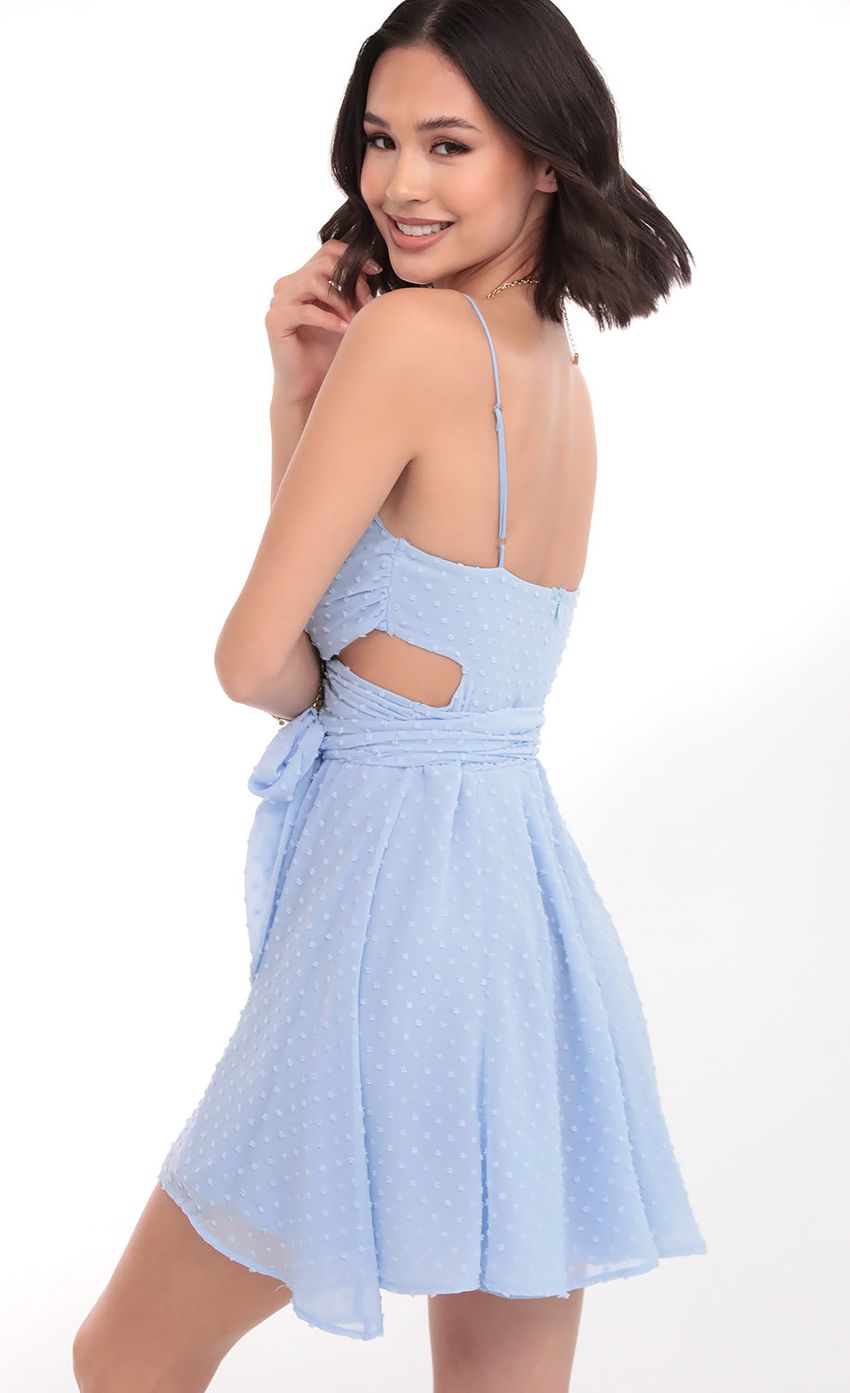 Picture Chiffon Wrap Dress in Blue Dots. Source: https://media-img.lucyinthesky.com/data/Mar20_1/850xAUTO/781A6138.JPG