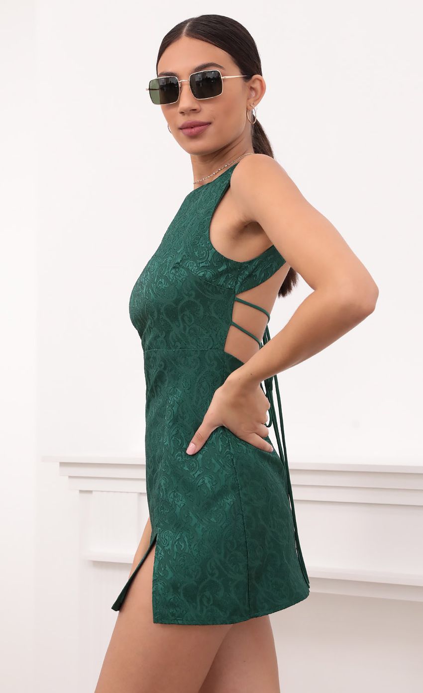 Picture Open Back Tank Dress in Green. Source: https://media-img.lucyinthesky.com/data/Mar21_1/850xAUTO/1V9A7091.JPG