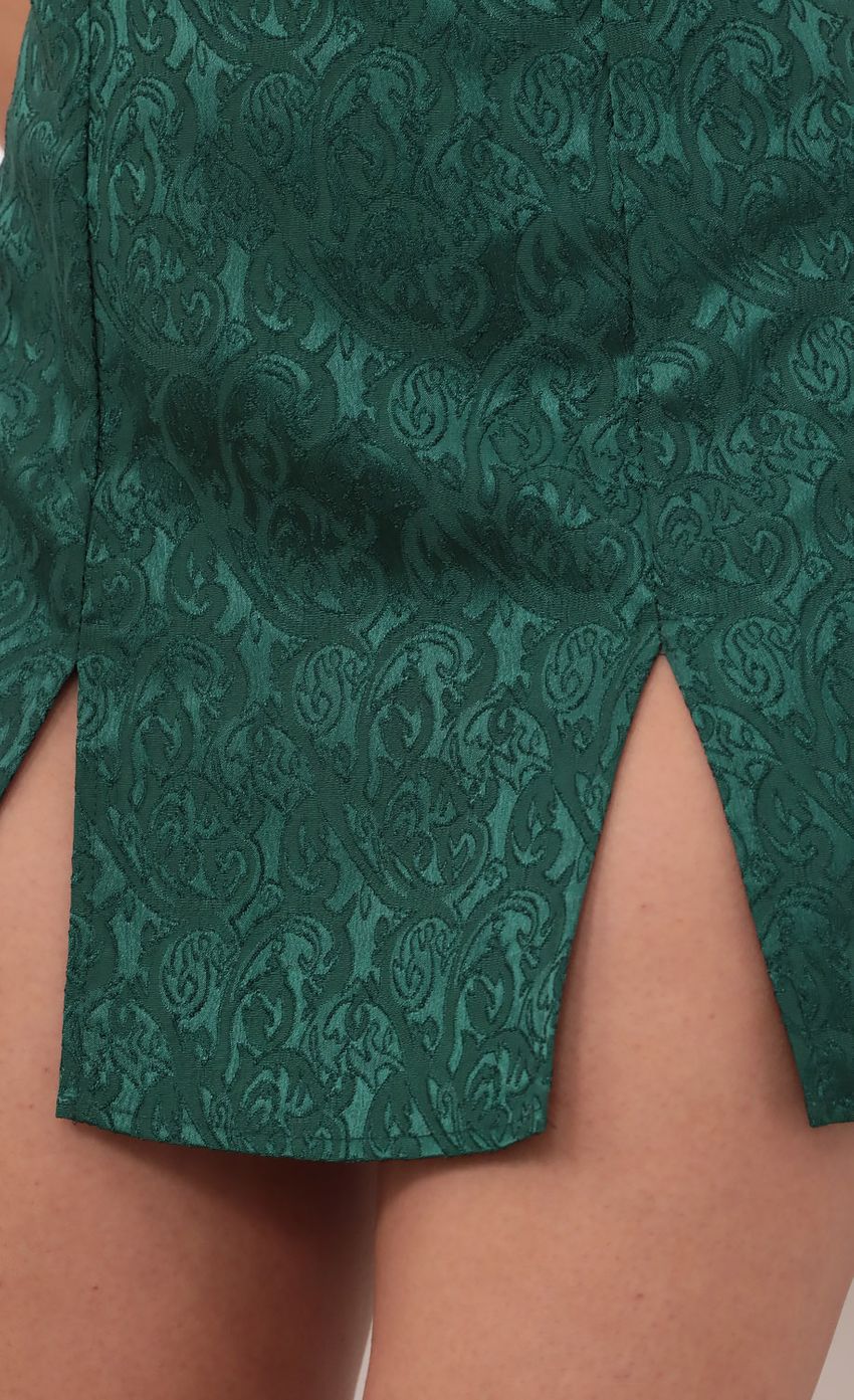 Picture Open Back Tank Dress in Green. Source: https://media-img.lucyinthesky.com/data/Mar21_1/850xAUTO/1V9A7145.JPG