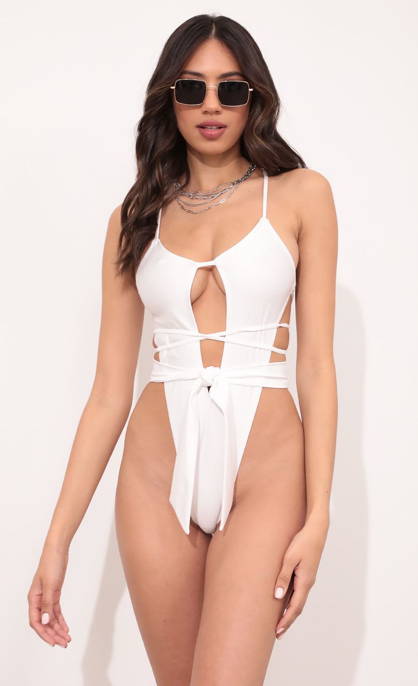 Picture Maui High Waisted Swimsuit in White. Source: https://media-img.lucyinthesky.com/data/Mar21_2/850xAUTO/1V9A1707.JPG