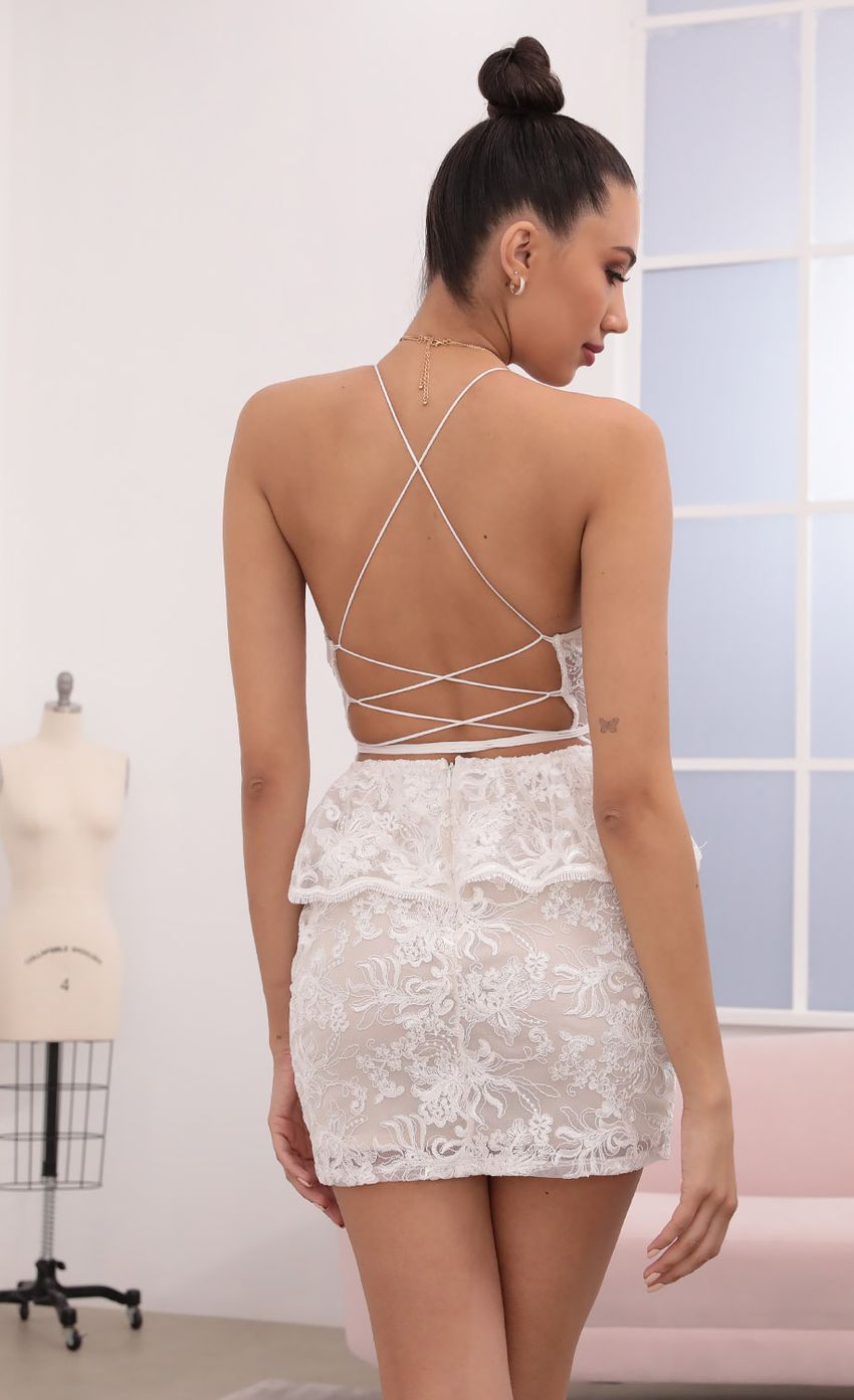 Picture Lace Peplum Dress in White. Source: https://media-img.lucyinthesky.com/data/Mar21_2/850xAUTO/1V9A5348.JPG