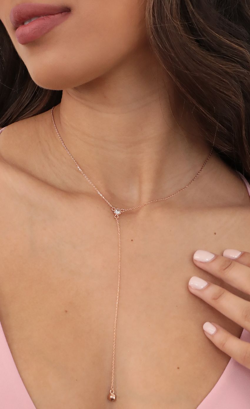 Picture Two Cubic Zirconia Lariat Necklace in Rose Gold. Source: https://media-img.lucyinthesky.com/data/Mar21_2/850xAUTO/AT2A0291_COPY.JPG