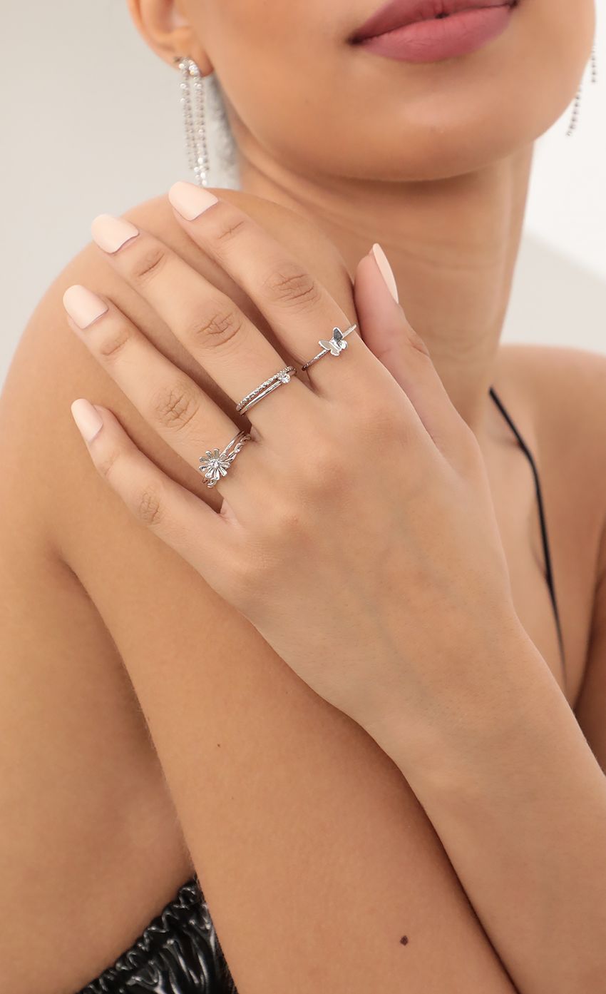 Picture Daisy Butterfly Dainty Silver Ring Set. Source: https://media-img.lucyinthesky.com/data/Mar21_2/850xAUTO/AT2A0660_COPY.JPG