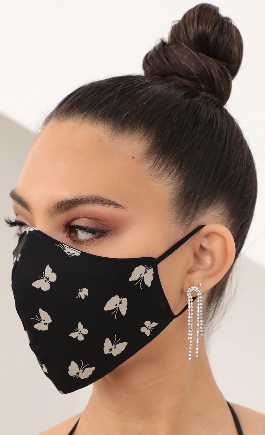Picture Crepe Butterfly Printed Mask in Black. Source: https://media-img.lucyinthesky.com/data/Mar21_2/850xAUTO/AT2A0785.JPG