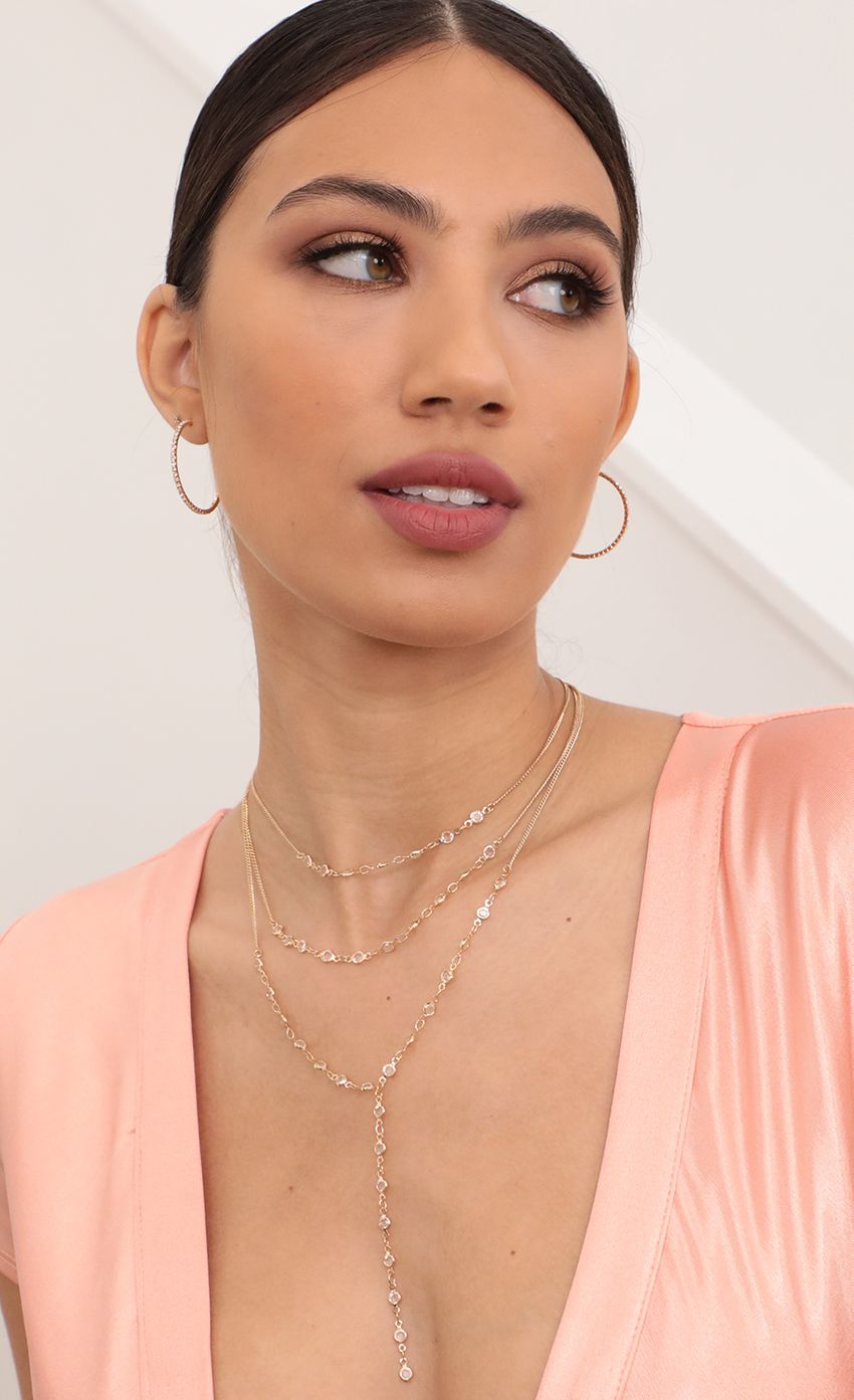 Picture Three Layer Crystal Necklace and Lariat Set. Source: https://media-img.lucyinthesky.com/data/Mar21_2/850xAUTO/AT2A1593_COPY_LARGER.JPG