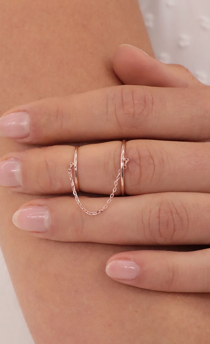Picture Rose Gold Chained Double Ring. Source: https://media-img.lucyinthesky.com/data/Mar21_2/850xAUTO/AT2A2145_COPY.JPG