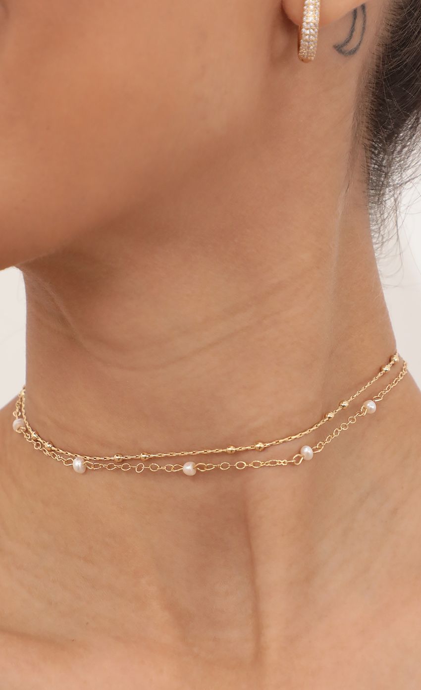 Picture Two layer Pearl Choker Set. Source: https://media-img.lucyinthesky.com/data/Mar21_2/850xAUTO/AT2A5117.JPG