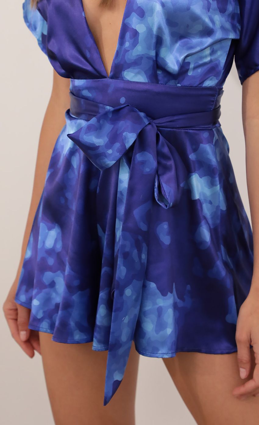 Picture Feeling The Night Satin Romper in Abstract Shades of Blue. Source: https://media-img.lucyinthesky.com/data/Mar21_2/850xAUTO/AT2A8685.JPG
