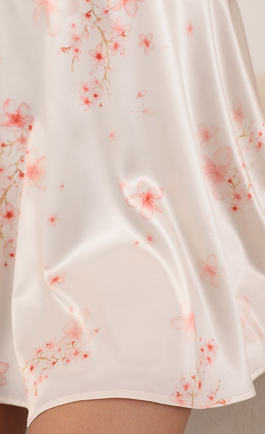 Picture A-Line Satin Dress in Coral Floral. Source: https://media-img.lucyinthesky.com/data/Mar21_2/850xAUTO/AT2A8901.JPG