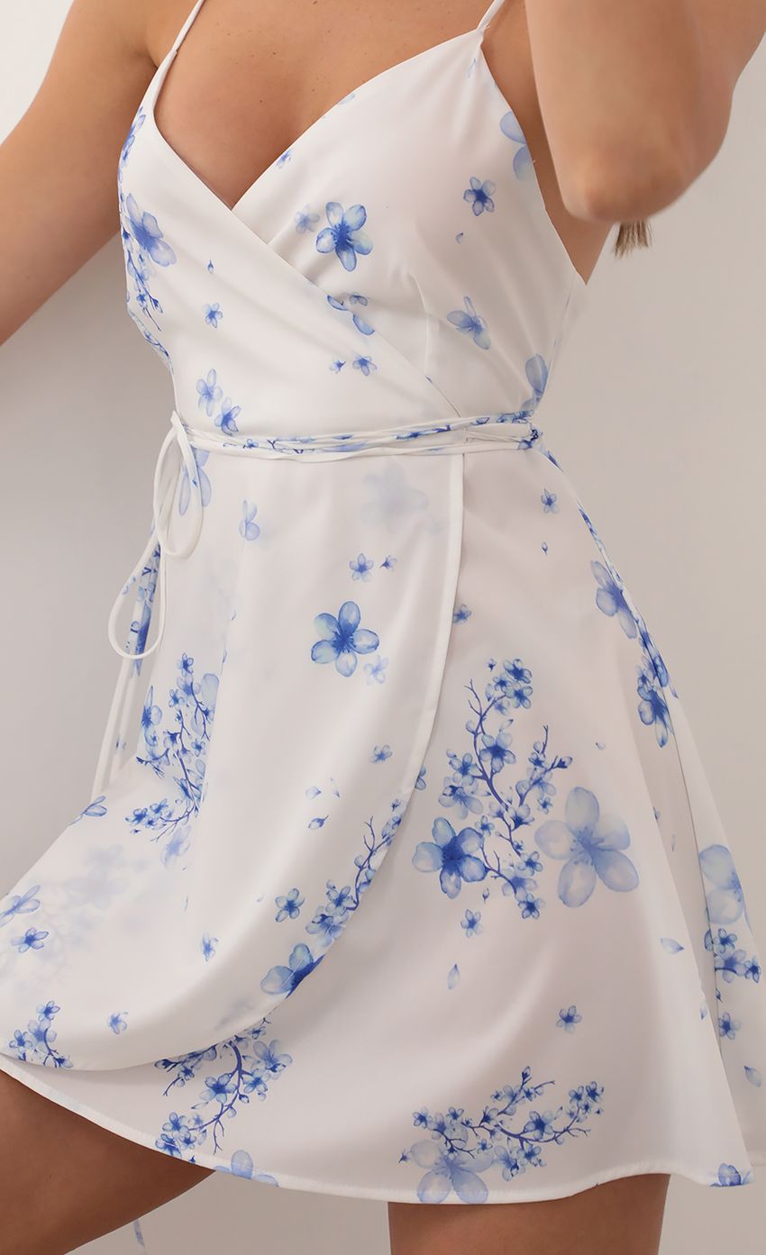 Picture A-Line Satin Dress in Floral Blue. Source: https://media-img.lucyinthesky.com/data/Mar21_2/850xAUTO/AT2A9770.JPG