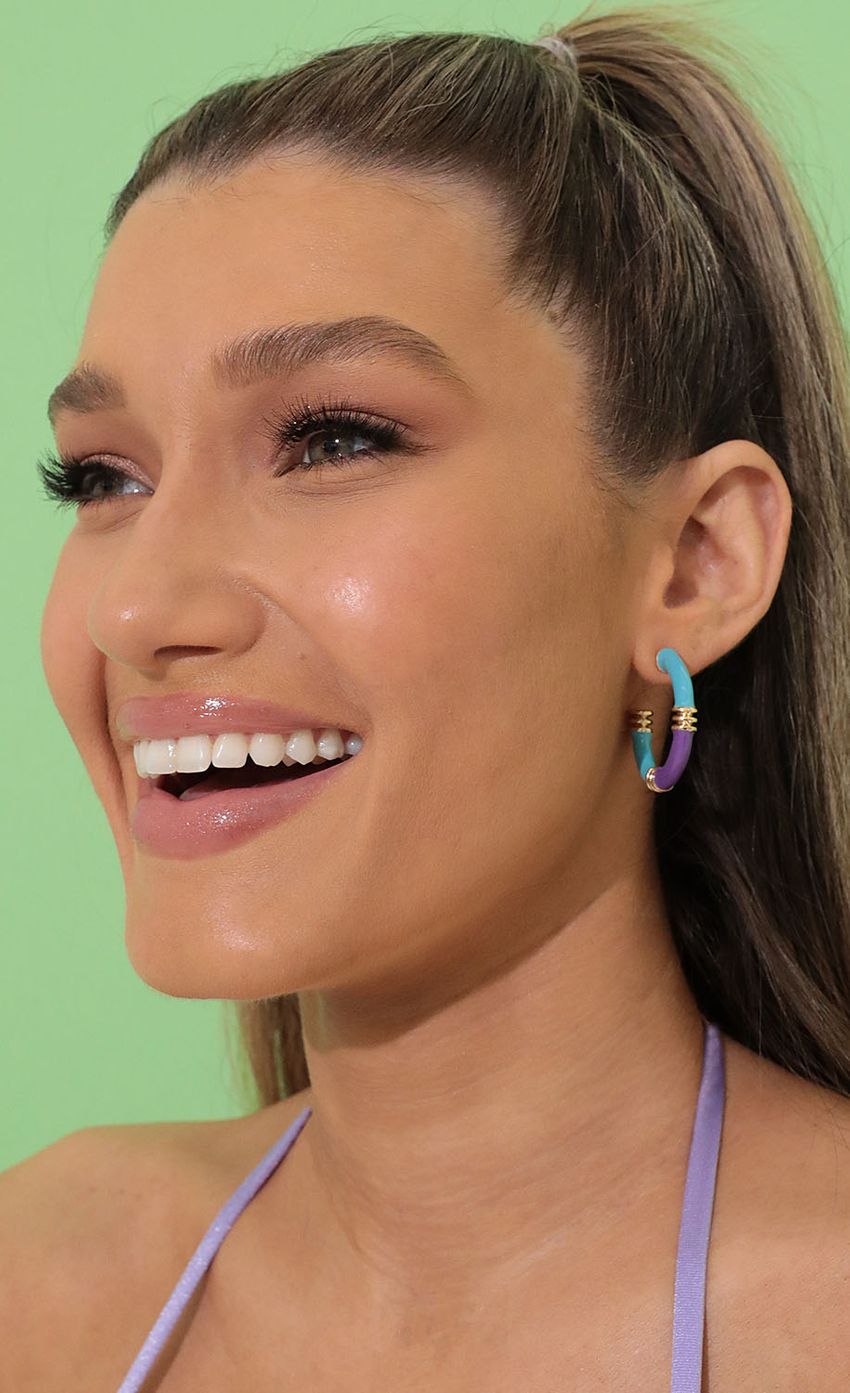 Picture Green Goddess Hoop Earrings in Blue and Purple. Source: https://media-img.lucyinthesky.com/data/Mar22_1/850xAUTO/1V9A04641.JPG