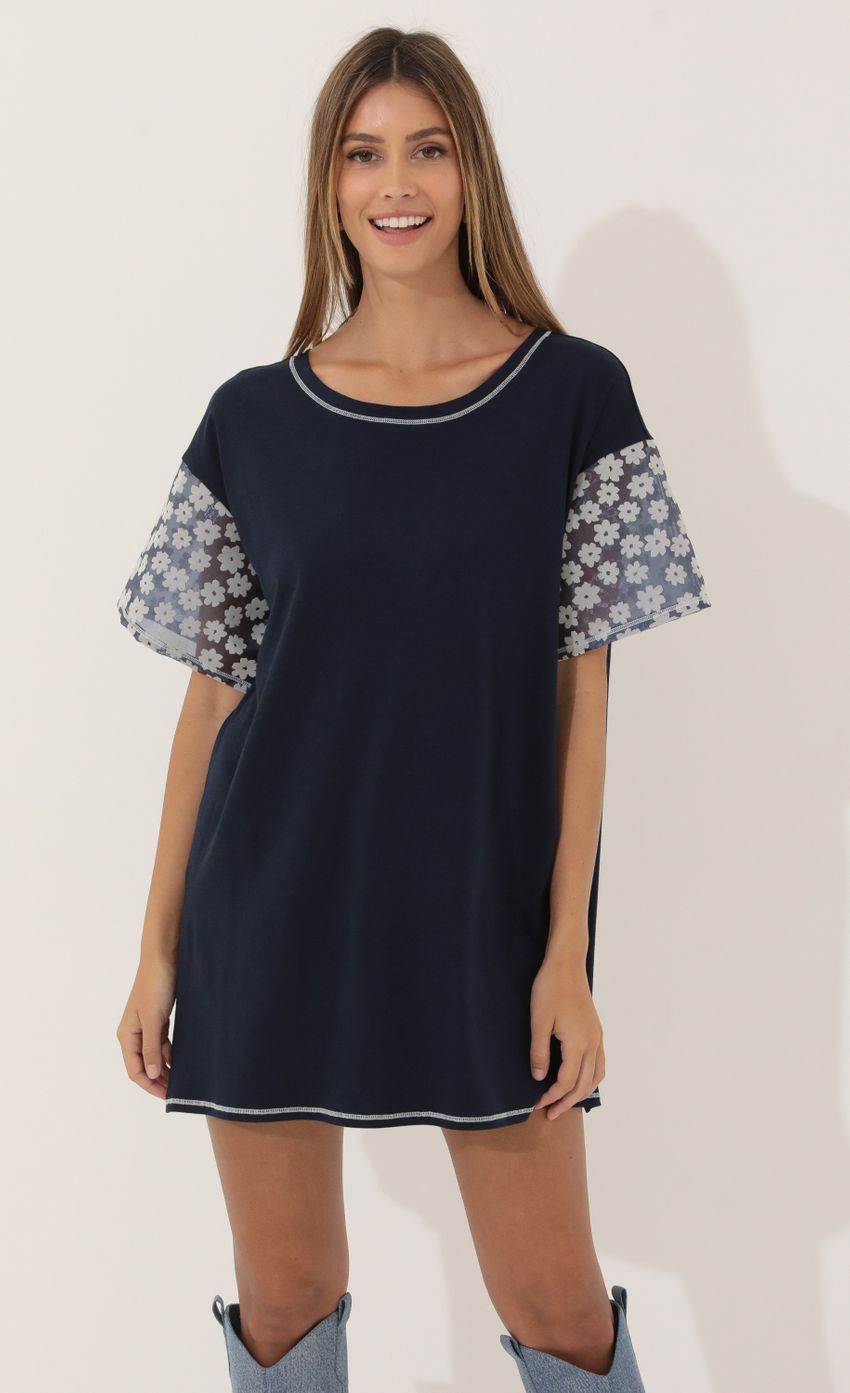 Picture Shirt Dress in Navy Floral. Source: https://media-img.lucyinthesky.com/data/Mar22_2/850xAUTO/1V9A0564.JPG