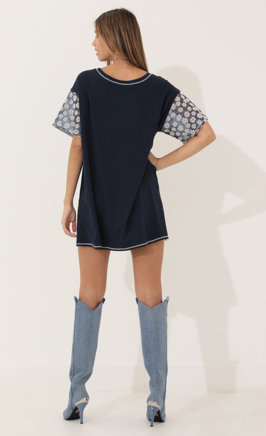Picture Shirt Dress in Navy Floral. Source: https://media-img.lucyinthesky.com/data/Mar22_2/850xAUTO/1V9A0670.JPG