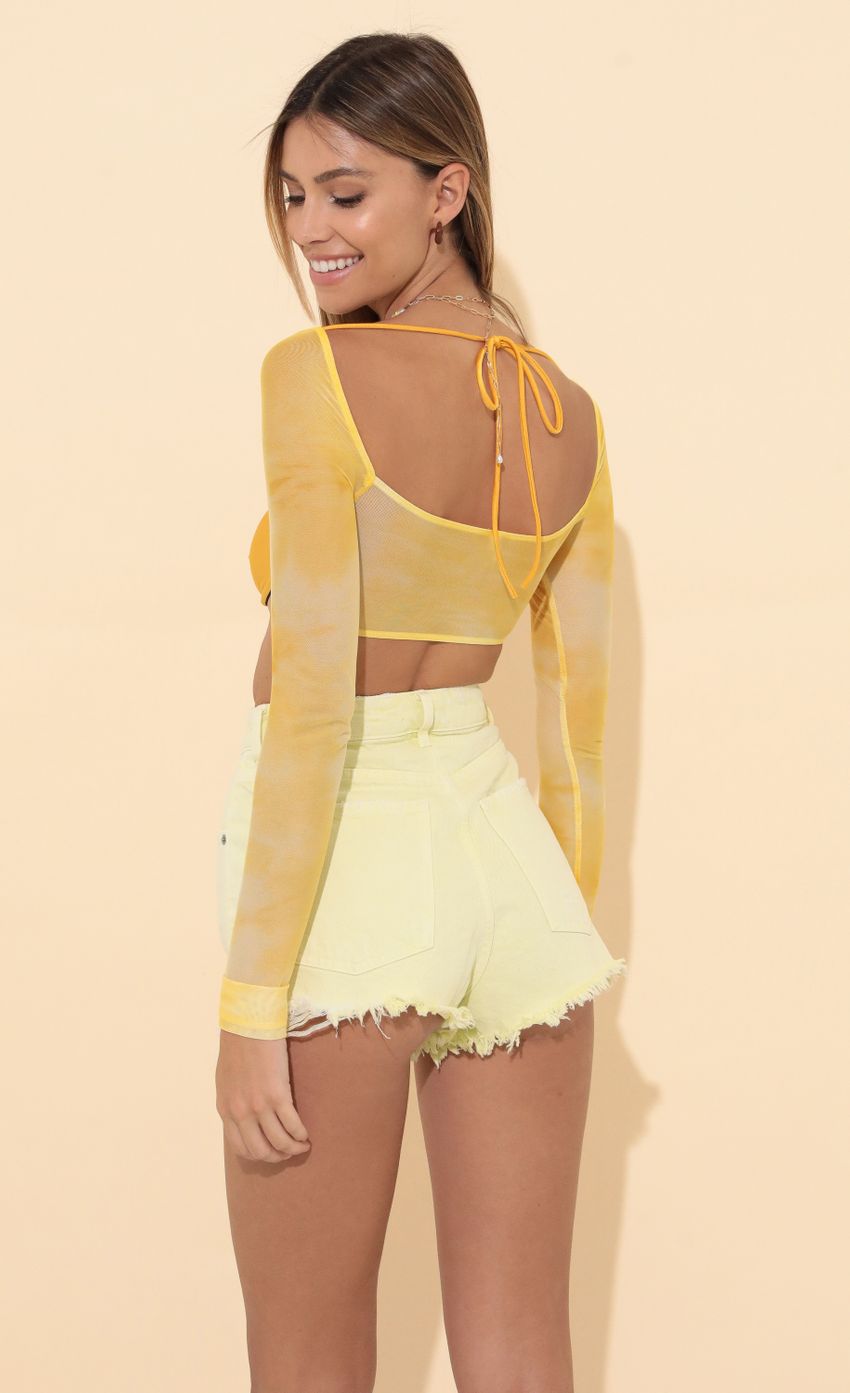 Picture Long Sleeve Top in Yellow. Source: https://media-img.lucyinthesky.com/data/Mar22_2/850xAUTO/1V9A1787.JPG