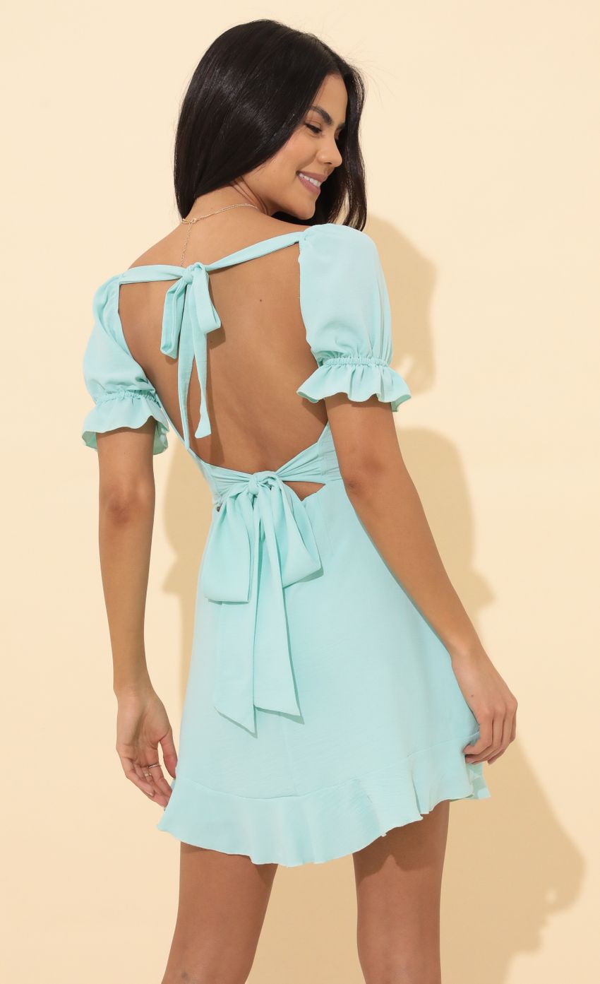 Picture Fit and Flare Dress in Turquoise. Source: https://media-img.lucyinthesky.com/data/Mar22_2/850xAUTO/1V9A4300.JPG