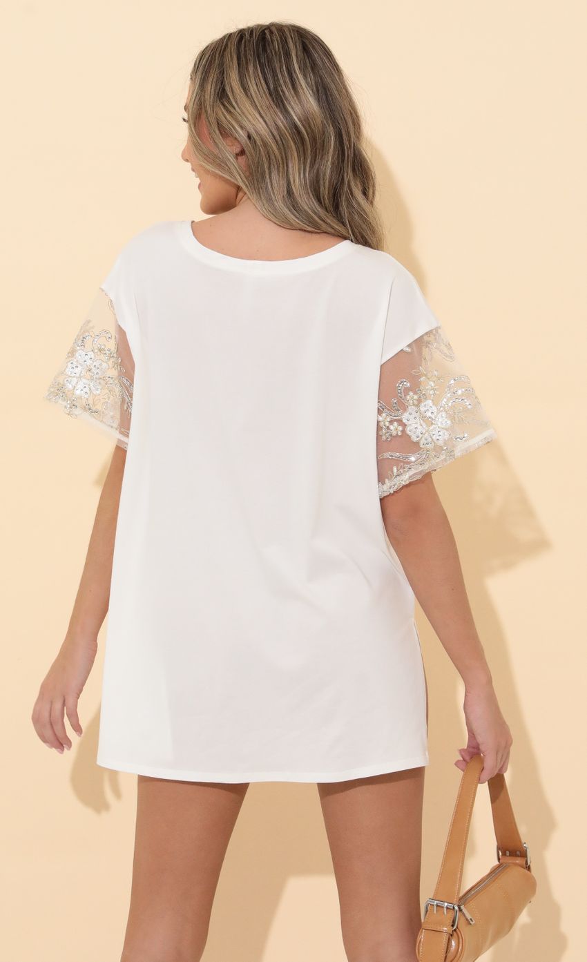 Picture Shirt Dress in White Gold Lace. Source: https://media-img.lucyinthesky.com/data/Mar22_2/850xAUTO/1V9A4929.JPG