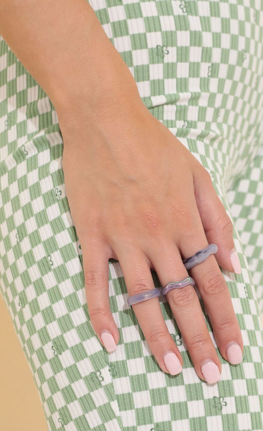 Picture Gummy Ring Set in Purple. Source: https://media-img.lucyinthesky.com/data/Mar22_2/850xAUTO/1V9A76471.JPG