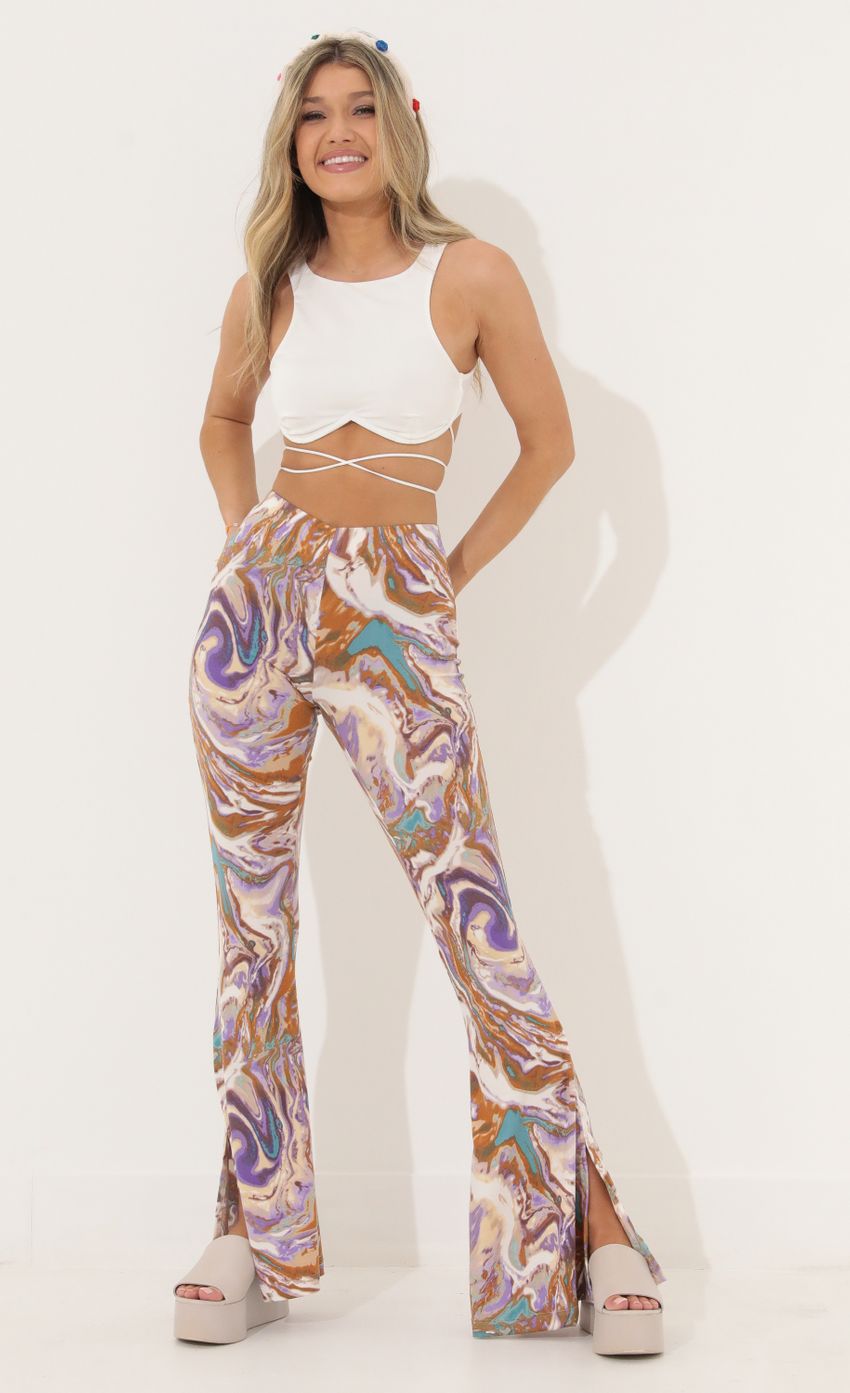 Picture Pant in Swirl Purple Multi. Source: https://media-img.lucyinthesky.com/data/Mar22_2/850xAUTO/1V9A8715.JPG