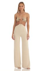 Picture Gold Sequin Halter Jumpsuit in Beige. Source: https://media-img.lucyinthesky.com/data/Mar23/150xAUTO/13af89fd-cc2c-45f0-b861-c347f9027779.jpg