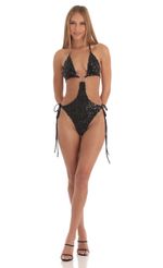 Picture Sequin O-Ring Monokini in Gold. Source: https://media-img.lucyinthesky.com/data/Mar23/150xAUTO/d6f0d34e-4555-4074-bd55-a1ac53122586.jpg
