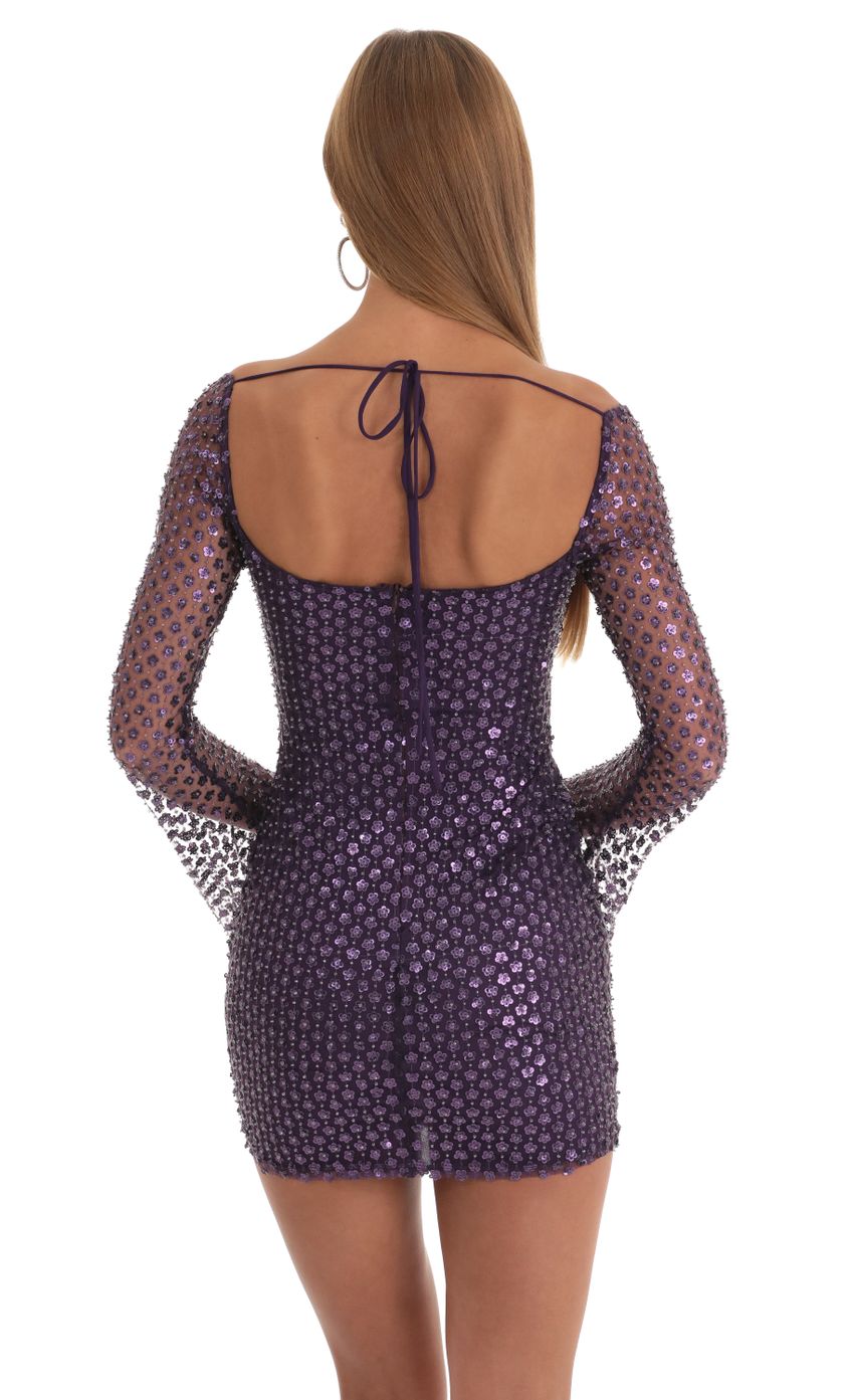 Picture Sequin Bell Sleeve Dress in Purple. Source: https://media-img.lucyinthesky.com/data/Mar23/850xAUTO/2622476b-fc92-48a1-8c70-ff32efeeef75.jpg