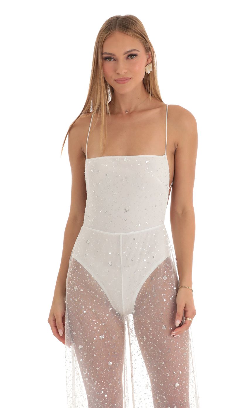 Picture Ceres Sequin Wide Leg Jumpsuit in White. Source: https://media-img.lucyinthesky.com/data/Mar23/850xAUTO/2a838be7-d477-46fd-97bc-462b7bc62398.jpg