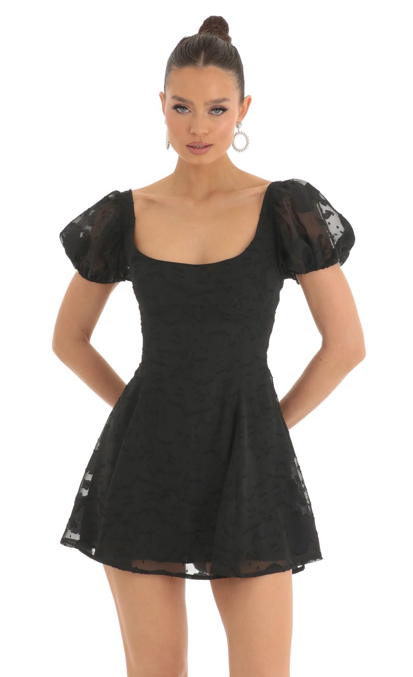 Picture Floral Puff Sleeve Dress in Black. Source: https://media-img.lucyinthesky.com/data/Mar23/850xAUTO/638f1627-6fd5-4fa7-9e6c-c3626fe6fde9.jpg