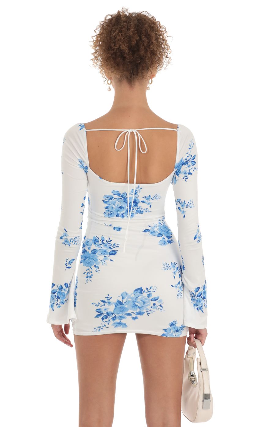 Picture Floral Long Sleeve Dress in White. Source: https://media-img.lucyinthesky.com/data/Mar23/850xAUTO/68600d5f-34ec-451d-a7f0-f94654fbe520.jpg
