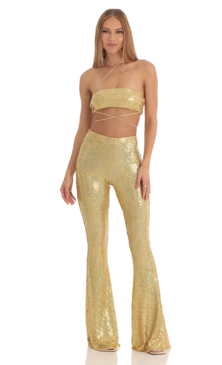 Picture Atlantis Iridescent Sequin Two Piece Pants Set in Gold. Source: https://media-img.lucyinthesky.com/data/Mar23/850xAUTO/6d0de768-fe2d-4e24-b0d7-509e8a3377f7.jpg