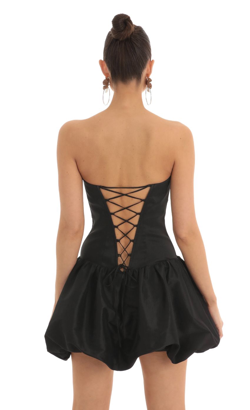 Picture Corset Bubble Dress in Black. Source: https://media-img.lucyinthesky.com/data/Mar23/850xAUTO/7ead077c-8b7a-4886-b38a-7eb14fa34579.jpg