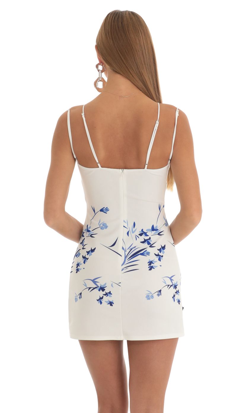 Picture Floral Cutout Dress in Blue and White. Source: https://media-img.lucyinthesky.com/data/Mar23/850xAUTO/85286e49-9580-460f-8a62-32fc5ba1c2f4.jpg