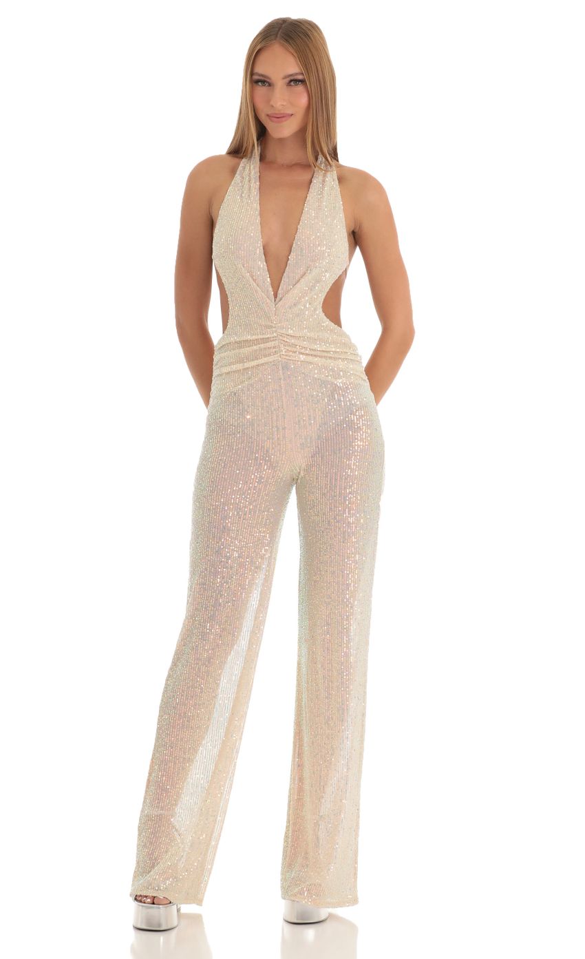 Picture Saga Sequin Plunge Halter Jumpsuit in Champagne. Source: https://media-img.lucyinthesky.com/data/Mar23/850xAUTO/9d5d0234-2abf-42ef-8d83-05f345711805.jpg
