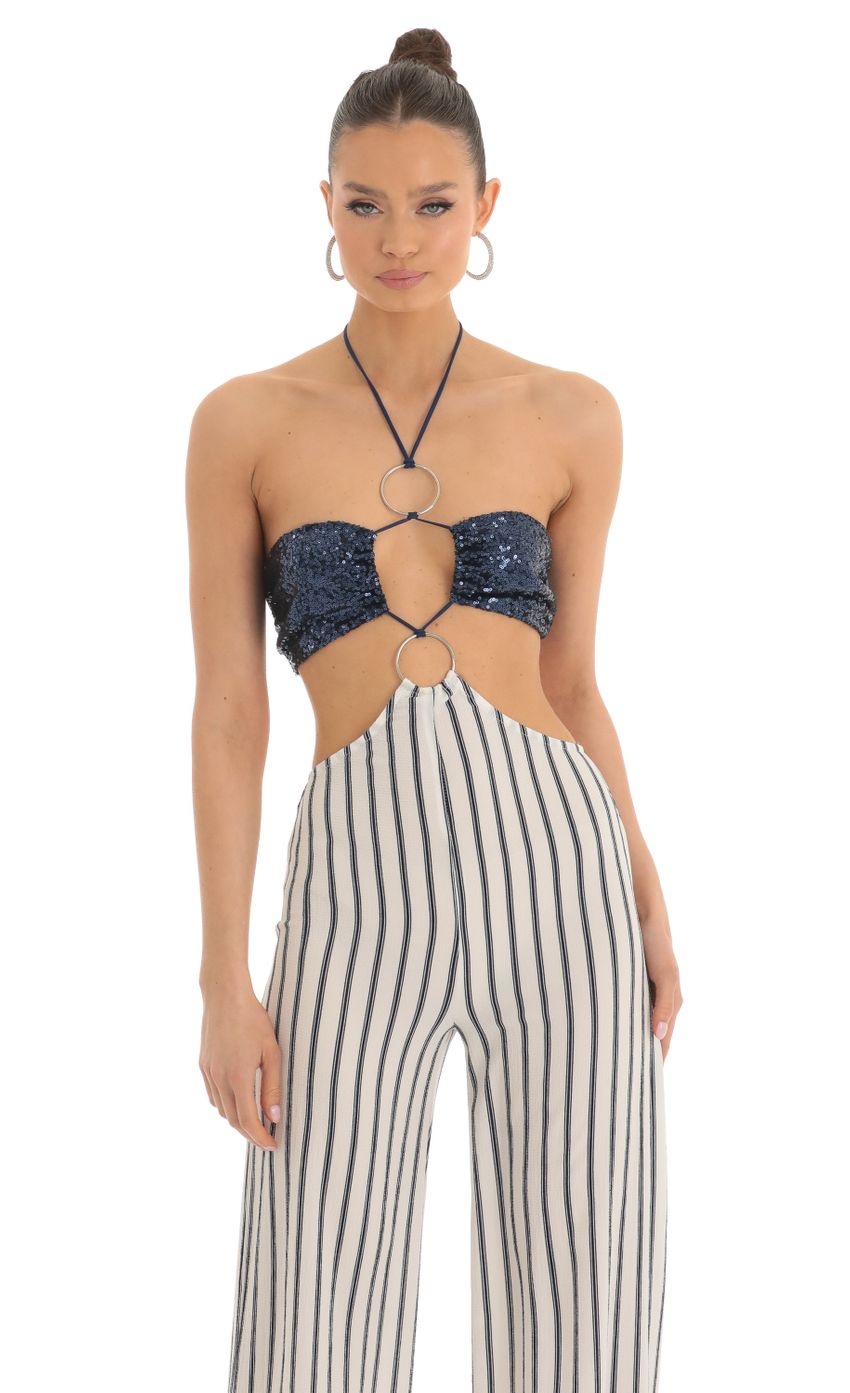 Picture Sequin Halter Striped Jumpsuit in White and Navy. Source: https://media-img.lucyinthesky.com/data/Mar23/850xAUTO/caeb4515-2129-4382-bd1c-22326454ea38.jpg