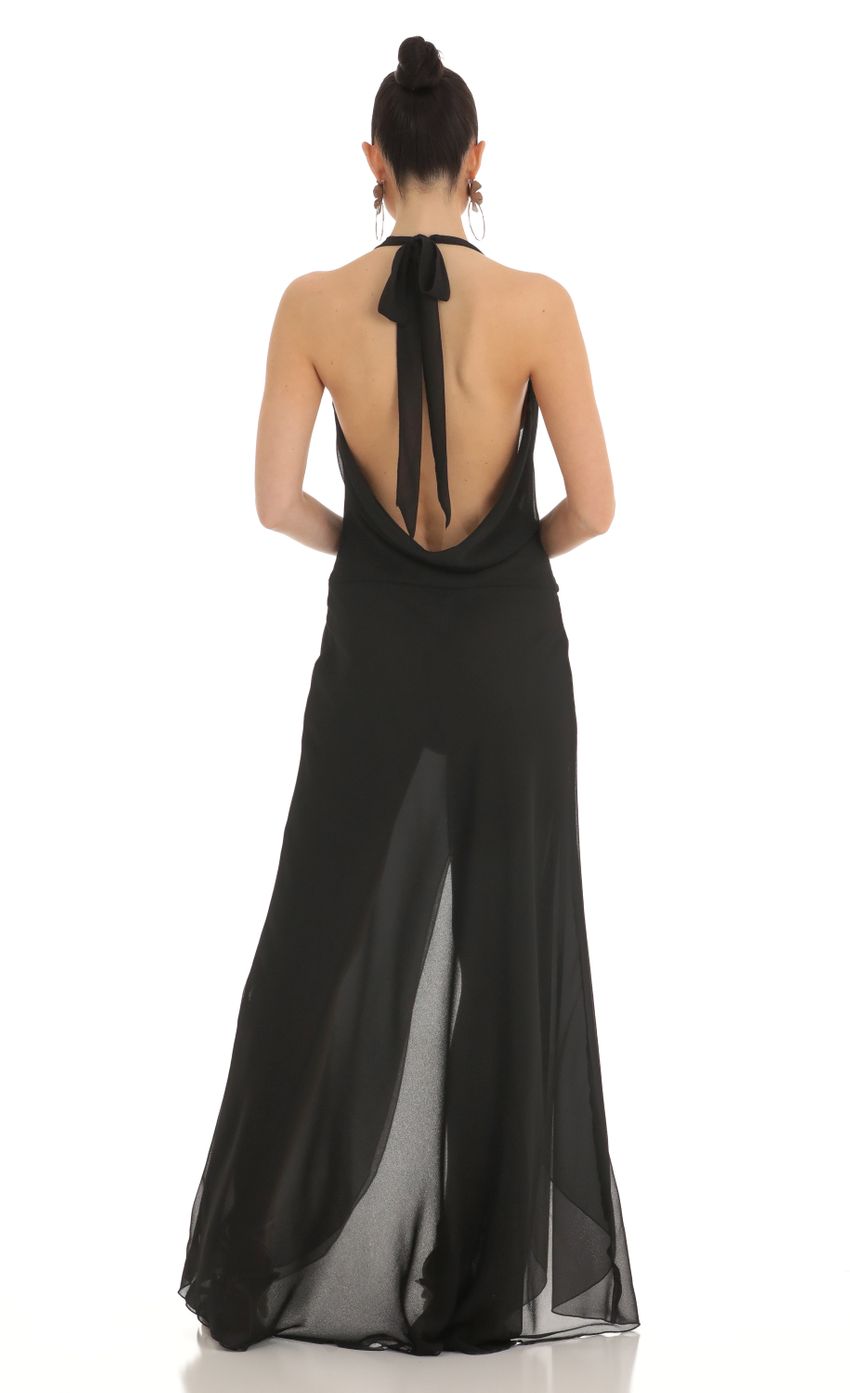 Picture Draped Open Back Maxi Dress in Black. Source: https://media-img.lucyinthesky.com/data/Mar23/850xAUTO/d47d5d68-a371-4765-b34f-3d7e2159bdb0.jpg