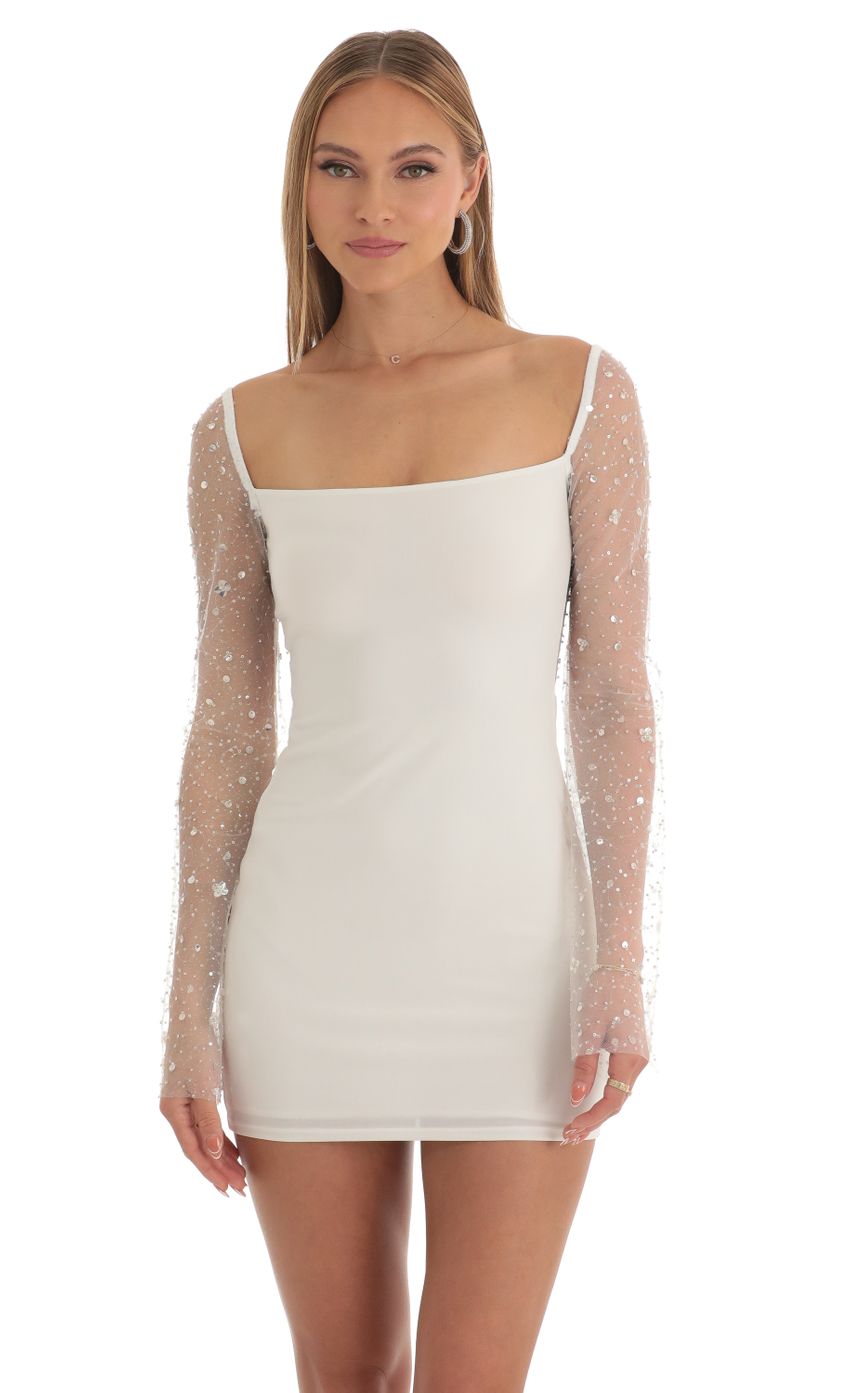 Picture Sequin Long Sleeve Dress in White. Source: https://media-img.lucyinthesky.com/data/Mar23/850xAUTO/dabc4bfd-60ff-484e-8de8-68d215777ed4.jpg