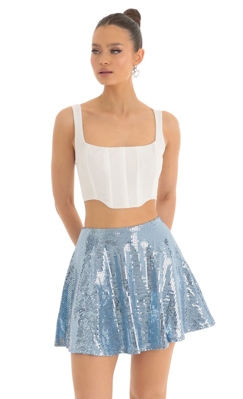 Picture Jasmin Sequin Square Skirt in Blue. Source: https://media-img.lucyinthesky.com/data/Mar23/850xAUTO/e5a42327-4332-4066-b5c7-5f88126fffd6.jpg