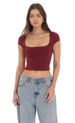 Picture Short Sleeve Crop Top in Maroon. Source: https://media-img.lucyinthesky.com/data/Mar24/150xAUTO/1e48ea8d-b1a1-4f2a-8526-712ca205372b.jpg