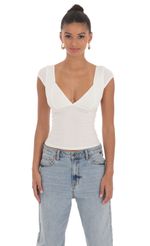Picture Short Sleeve V-Neck Top in White. Source: https://media-img.lucyinthesky.com/data/Mar24/150xAUTO/29f80c3a-0cea-4717-a377-7bf5ce154832.jpg