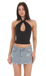 Picture Cross Neck Halter Top in Black. Source: https://media-img.lucyinthesky.com/data/Mar24/150xAUTO/2da7f504-2c2b-4ae8-be4a-161d01a8c175.jpg