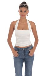 Picture Halter Ruched Top in White. Source: https://media-img.lucyinthesky.com/data/Mar24/150xAUTO/2f5128a1-5143-43cb-a2c6-93c305154989.jpg