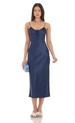 Picture Satin Open Back Midi Dress in Navy. Source: https://media-img.lucyinthesky.com/data/Mar24/150xAUTO/329c1552-e489-4f4c-95ac-df32a2df98d7.jpg