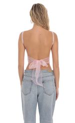 Picture Embroidered Open Back Top in Pink. Source: https://media-img.lucyinthesky.com/data/Mar24/150xAUTO/6328afa1-6656-4588-8f85-85ed74fde8f1.jpg