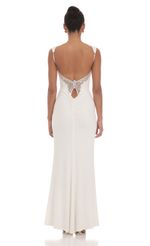Picture Back Sequin Butterfly Maxi Dress in White. Source: https://media-img.lucyinthesky.com/data/Mar24/150xAUTO/7041d1c3-6099-4082-bd78-5f6ed9b607f1.jpg