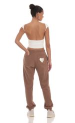Picture Heart Cinched Sweatpants in Brown. Source: https://media-img.lucyinthesky.com/data/Mar24/150xAUTO/766e6a92-7d78-4ed0-9288-cd81199eccf1.jpg