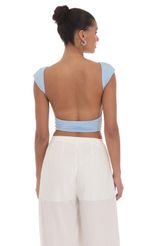Picture Open Back Top in Blue. Source: https://media-img.lucyinthesky.com/data/Mar24/150xAUTO/77475d5f-16d1-48f8-9a63-29750e4c5d07.jpg